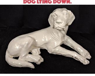 Lot 127 Pottery Dog Sculpture. Dog lying down. 