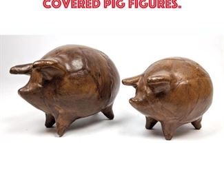Lot 148 2 SARRIED LTD. Leather covered Pig Figures. 