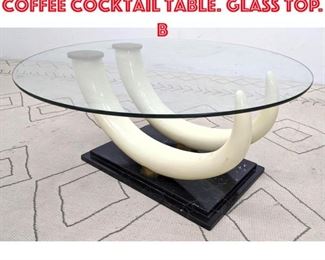 Lot 160 Decorator Faux Tusk Coffee Cocktail Table. Glass Top. B
