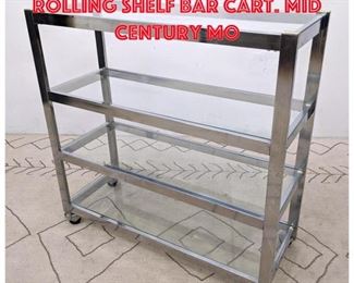 Lot 461 Chrome and glass rolling Shelf bar cart. Mid Century Mo