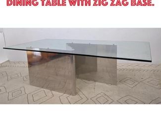 Lot 553 Large Metal and Glass Dining table with zig zag base. 