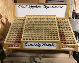 Huge collection of dentistry collectibles including this vintage toothbrush display.