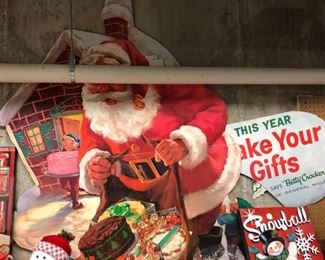 Large vintage Christmas display featuring Santa Claus.