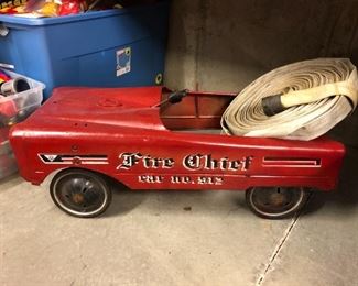 Vintage AMF "Fire Chief" pedal car No. 512.