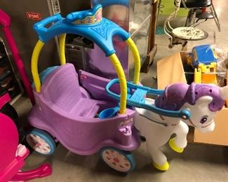Little Tikes ride on magical unicorn carriage.