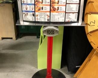 Vintage A&W-style drive-in restaurant ordering stand. 