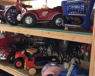 Sampling of ride-on cars and trucks for children.