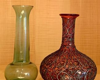 Item 148:  Pretty hand blown green vase and burgundy vase wrapped in ornate silver: $28                                                       Tallest - 7.5"