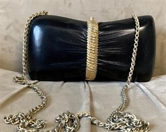 Item 180:  Rodo Black and Gold crossbody hard case purse: $38