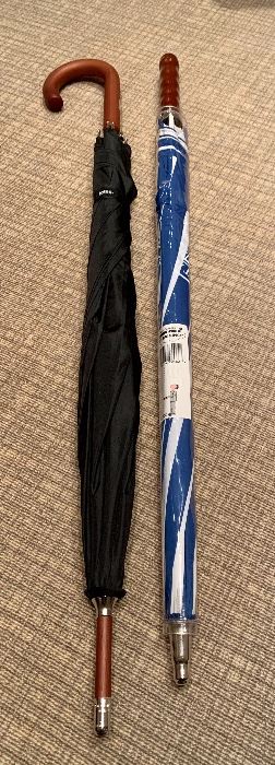 Item 203:  Black Totes Umbrella and Blue and White Umbrella: $22