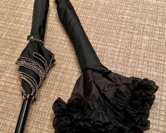 Item 205:  Two black, vintage umbrellas: $28