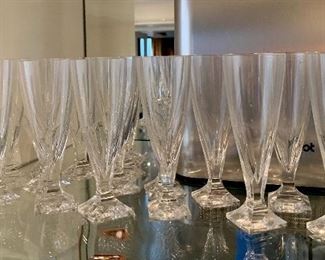 Item 228:  Signed Champagne Glasses - large set: $125