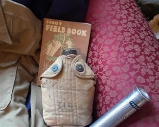 Canteen, flashlight, and Boy Scout field book