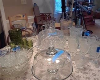 Cake plates, punch bowl with cups, pitchers, and other glassware