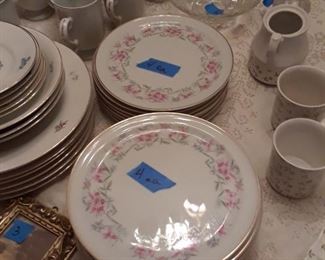 Set of porcelain dinner plates and salad plates