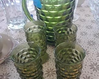 Green glasses and pitcher