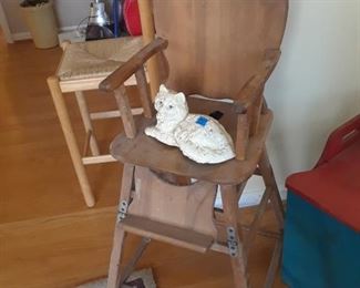 High chair and cast iron cat