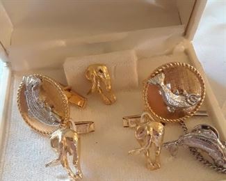 Two sets of cuff links and tie tacks