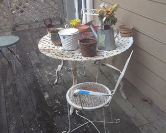 Wrought iron table and cafe chairs
