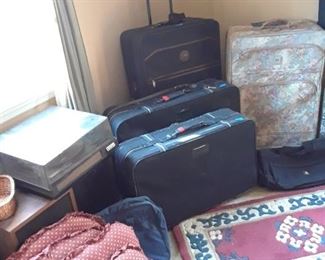 Chair cushions, area rug, luggage, another turntable