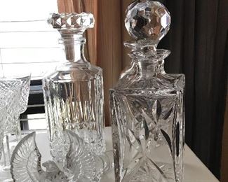Fine crystal decanters, bird from Austria.  One decanter is Wedgwood 