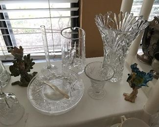 Crystal vases, whimsical pottery pieces