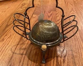 Vintage silver plate butter/toast server (signed).  Knob is wood.