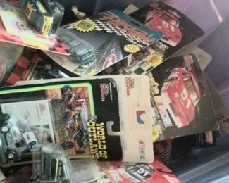 A bucket of die cast cars, sold individually 