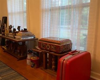 Samsonite suitcase, carved wooden tables and stools, collectible tin boxes. 