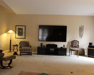 Overview of Family Room, Chairs, Floor Lamp, Art, Large Screen TV, TV Console