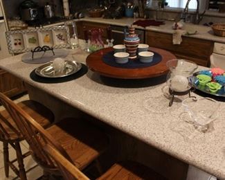 Island in Kitchen. Steuben Bowl, Candles, Chrome Trays, Serving Items