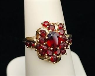 14k yellow gold and garnet vintage ring size 7, weighing 3.8g.  $280