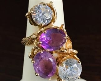 Huge 14k yellow gold brutalist one of a kind artisan ring featuring amethyst and CZs.  It is size 5, weighing 12.5g.  $840