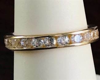 14k yellow gold band encircled with sparkly CZs.  Ring is size 6.5, and weighs 2.5g.  $198