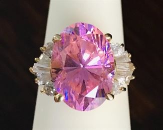 10k yellow gold ring with big pink and clear sparkly CZs. Size 6, weighing 6.1g.  $248