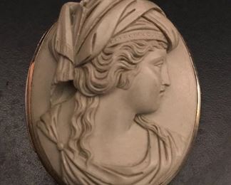 Large finely carved antique (mid to late 1800s) lava cameo in 14k yellow gold frame.  2" tall by 1.5" wide and 1/2" deep, weighing 25.1 grams.  It is signed on the back, but illegible.  $1450
