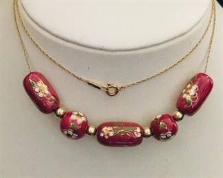 14k yellow gold 24" chain with five gilded cloissonne  flower beads and 14k spacer beads.   Total weigh 11.0g.  $368