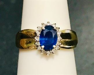 14k yellow gold signed NISSKO blue sapphire and diamond ring, size 6.5.  Weight is 2.6g.  $428