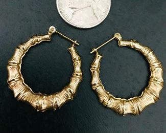 Vintage14k yellow gold bamboo hoop earrings, measuring one inch in diameter, and weighing 2.1g.  $248