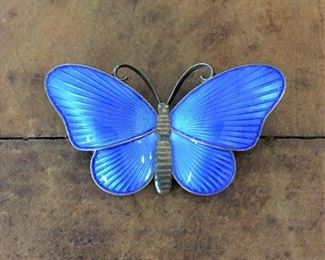 Ivar T. Holth Norwegian mid-century enamel and sterling silver butterfly brooch. Size 1 5/8" w x 7/8" h. Signed with H inside circle, stamped 925 S STERLING NORWAY. Rolling c-clasp works perfectly. $120
