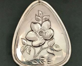 Large Towle sterling silver reversible 1973 Christmas pendant or ornament, measuring 3" tall by 2" wide.  Weighs 25.4g.  $88