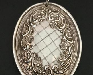 Large Towle sterling silver reversible 1975 Christmas pendant or ornament, measuring 3" tall by 2 1/8" wide.  Weighs 25.0g.  $78