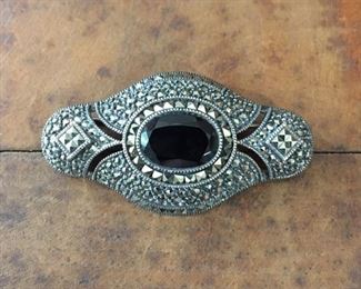 Vintage Judith Jack sterling, onyx and marcasite brooch, size 2 1/16" w x 1 1/8" h.  Signed with JJ logo mark, stamped STERLING.  $98
