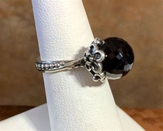 Pandora ring size 5 1/2. Size of faceted black stone in bezel is 7/16" diameter. Signed ALE 50, stamped S 925. $88 