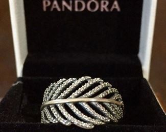 Pandora sterling silver feather motif ring, accented with clear crystals, size 8 1/2. Width is 1/2". Signed S925 ALE 60 inside band. Pandora box shown in photo is included. $98