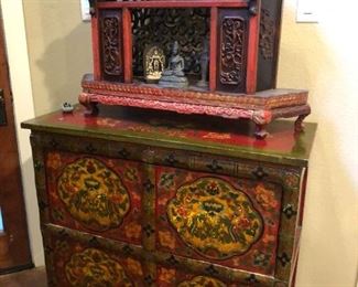 Chinese carved, pierced and painted wood Buddhist shrine on Tibetan painted wood cabinet