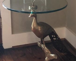 “Peacock” occasional table with brass base and glass top