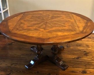 Round pedestal dining table with inlaid mixed woods parquetry top, 29” high x 60” diameter