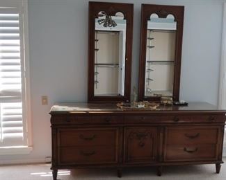 25.Thomasville triple dresser   with  mirror.   It  is  79"  wide.