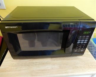 Small Emerson Microwave with Turntable. Dimensions "17""x10"" cabinet
10 1/2"" by 7"" internal "